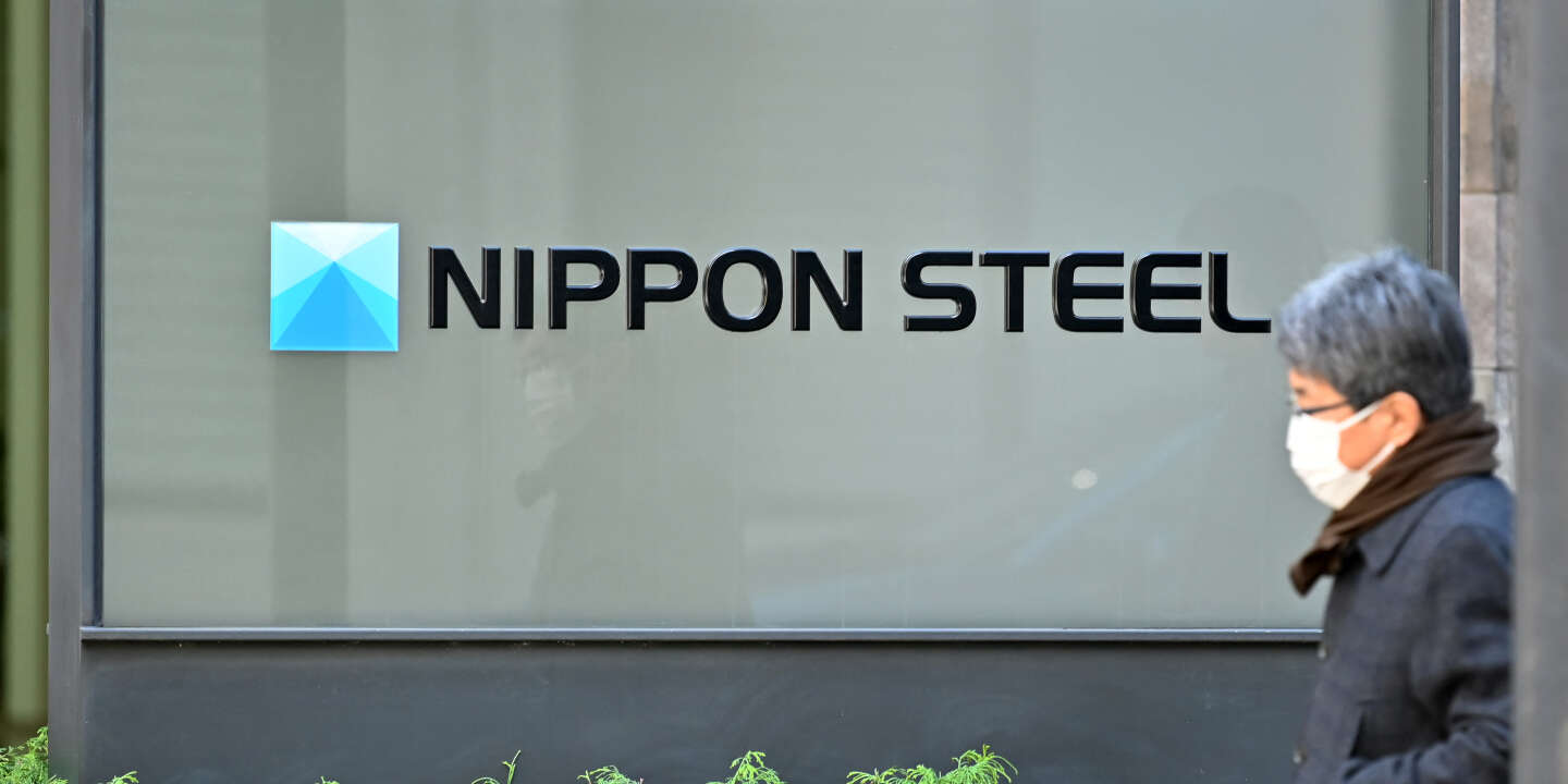 The logo of Nippon Steel Corp. is seen at an office building where the company's head office in Tokyo on December 19, 2023. Shares in Japan's Nippon Steel sank more than six percent on December 19 after it announced a deal to buy US Steel for more than $14 billion that will create the world's number two steelmaker. (Photo by Kazuhiro NOGI / AFP)